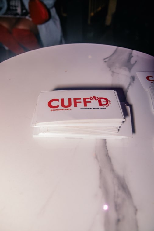 Cuff'd cards spread across the table