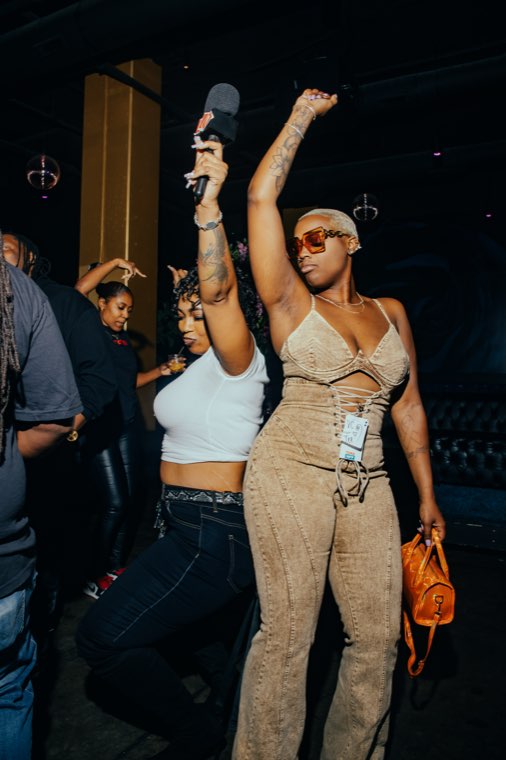 Attendees dancing at the event