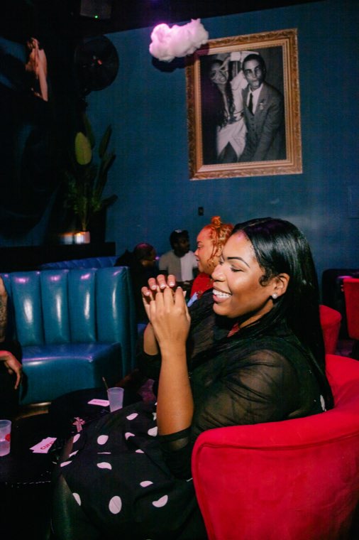 Attendees laughing together at a Cuff'd or Curv'd event